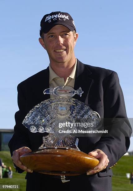 Jonathan Kaye holds the winners trophy after final round competition February 1, 2004 at the 2004 FBR Open at the Tournament Players Club at...