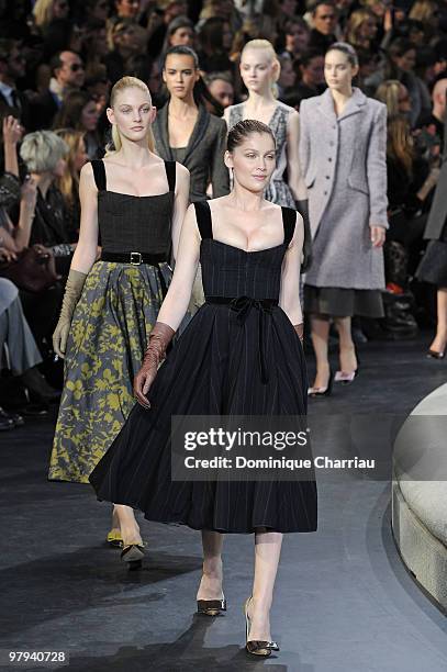 Model Laetitia Casta walks the runway during the Louis Vuitton Ready to Wear show as part of the Paris Womenswear Fashion Week Fall/Winter 2011 at...