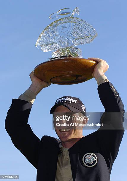 Jonathan Kaye holds the winners trophy after final round competition February 1, 2004 at the 2004 FBR Open at the Tournament Players Club at...