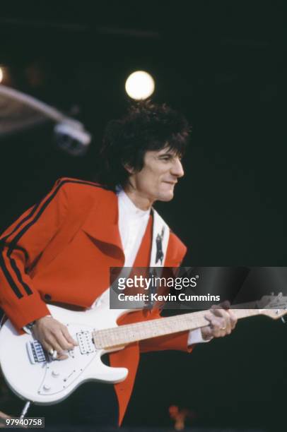 Ronnie Wood, guitarist with British band The Rolling Stones, performs on stage during the Urban Jungle tour in 1990.