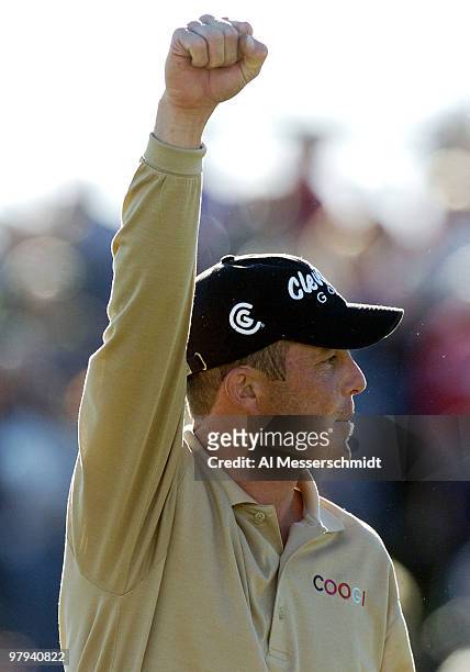 Jonathan Kaye pumps his fist on the 18th green after final round competition February 1, 2004 at the 2004 FBR Open at the Tournament Players Club at...