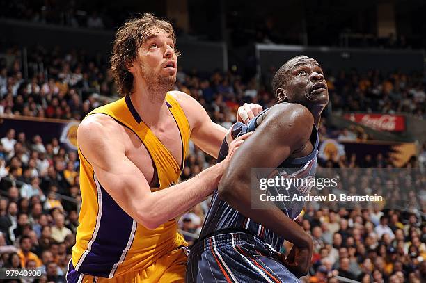 Pau Gasol of the Los Angeles Lakers and DeSagana Diop of the Charlotte Bobcats look for the rebound during the game on February 3, 2010 at Staples...