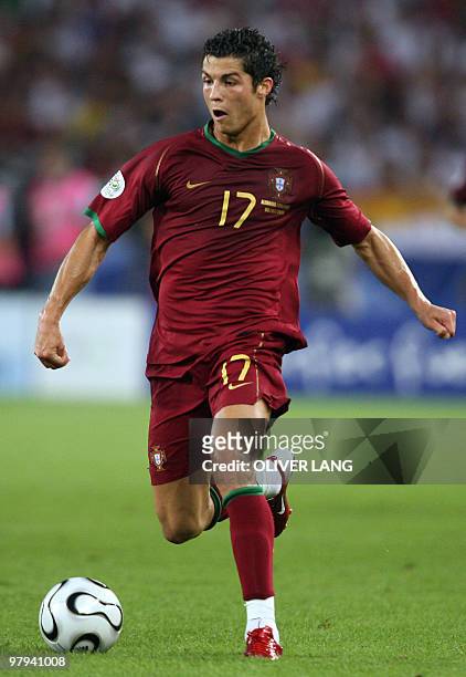 Portuguese forward Cristiano Ronaldo dribbles the ball during the third-place playoff 2006 World Cup football match between Germany and Portugal at...
