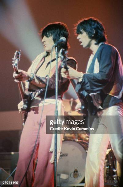 Guitarists Ronnie Wood and Keith Richards of The Rolling Stones perform on stage at the New Bingley Hall, Stafford in May 1976.