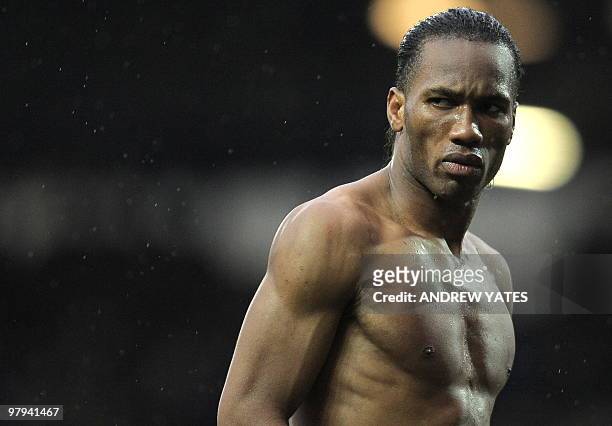 Chelsea's Ivorian forward Didier Drogba reacts as he leaves the field after a 1-1 draw with the Blackburn Rovers in their English Premier League...