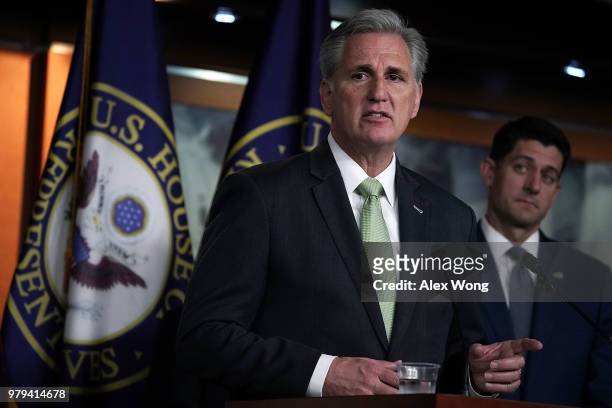 House Majority Leader Rep. Kevin McCarthy speaks as Speaker of the House Rep. Paul Ryan listens during a news conference June 20, 2018 on Capitol...