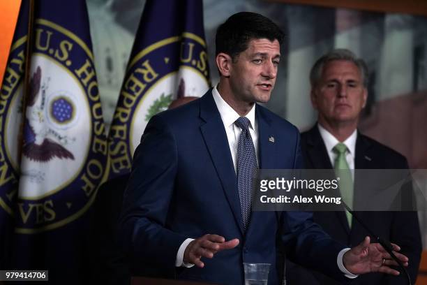 Speaker of the House Rep. Paul Ryan speaks as House Majority Leader Rep. Kevin McCarthy listens during a news conference June 20, 2018 on Capitol...