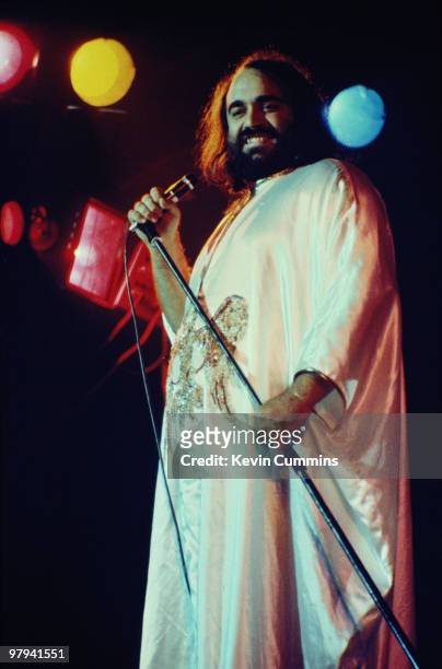 Greek singer Demis Roussos performs on stage at the Belle Vue in Manchester, England on October 17, 1976.