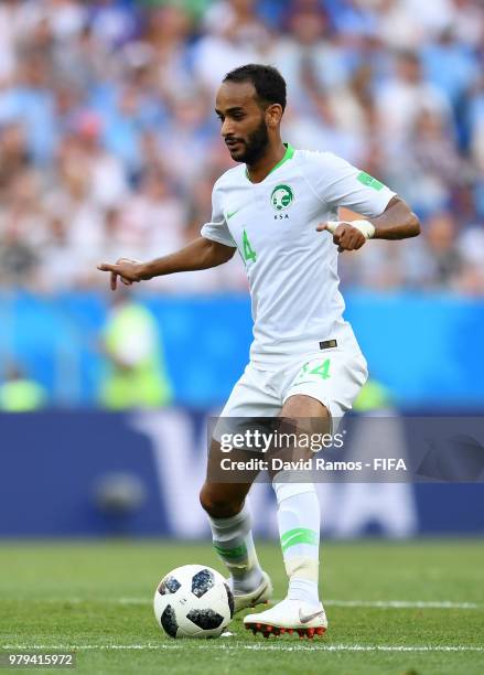 Abdullah Otayf of Saudi Arabia runs with the ball during the 2018 FIFA World Cup Russia group A match between Uruguay and Saudi Arabia at Rostov...