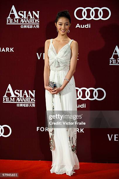 Taiwanese actress Guey Lun-mei poses on the red carpet for the 4th Asian Film Awards ceremony at the Convention and Exhibition Centre on March 22,...