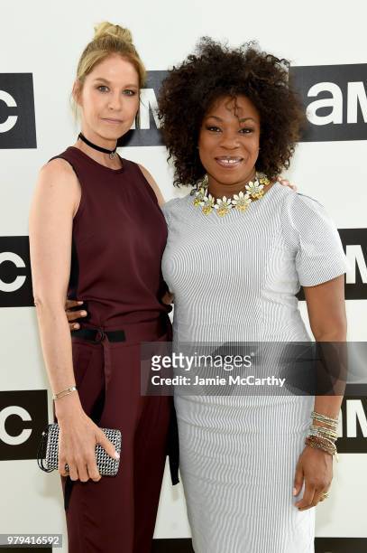 Actors Jenna Elfman and Lorraine Touissant attend the AMC Summit at Public Hotel on June 20, 2018 in New York City.