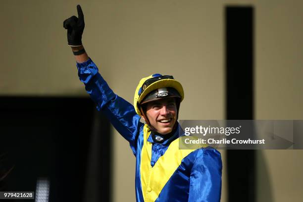 James Doyle celebrates as he rides Poet's Word to win The Prince of Wales Stakes as he beats Frankie Dettori on Cracksman on day 2 of Royal Ascot at...