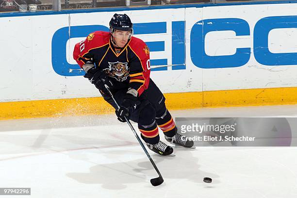 David Booth of the Florida Panthers skates with the puck against the Phoenix Coyotes at the BankAtlantic Center on March 18, 2010 in Sunrise, Florida.