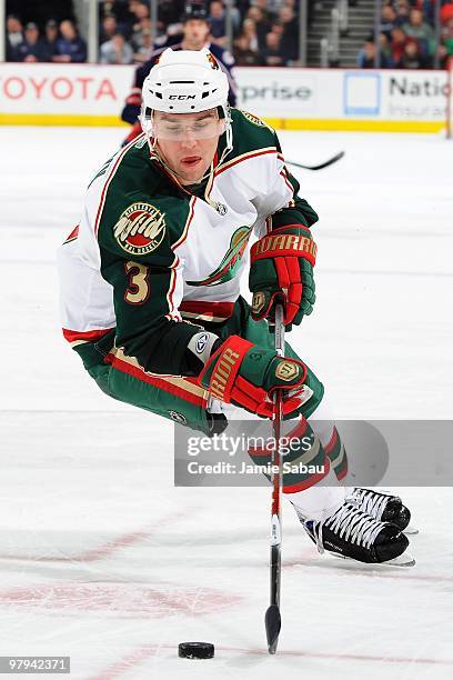 Defenseman Marek Zidlicky of the Minnesota Wild skates with the puck against the Columbus Blue Jackets on March 19, 2010 at Nationwide Arena in...