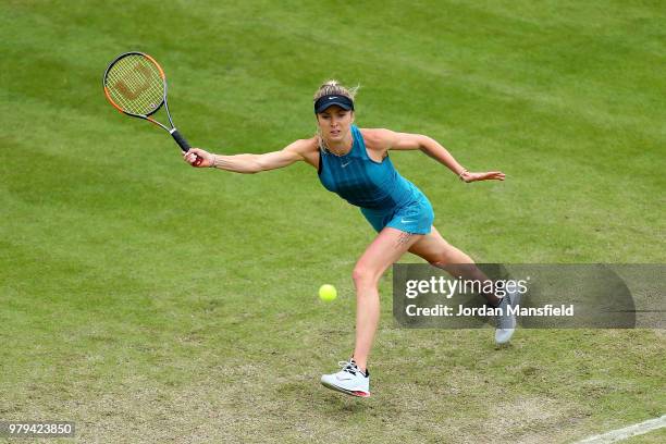 Elina Svitolina of the Ukraine plays a forehand during her Round of 16 match against Alize Cornet of France during Day Five of the Nature Valley...