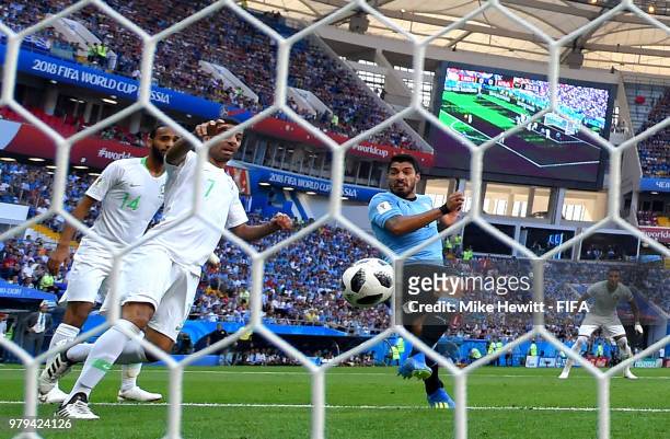 Luis Suarez of Uruguay scores his team's first goal during the 2018 FIFA World Cup Russia group A match between Uruguay and Saudi Arabia at Rostov...