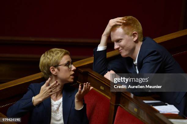 La France Insoumise" Clementine Autain and Adrien Quatennens react as ministers answer deputies during the weekly session of questions to the...