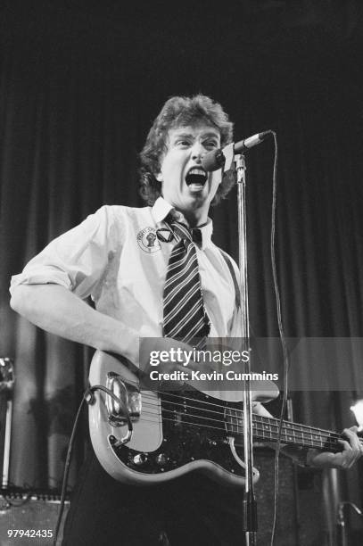 Singer and bassist Tom Robinson of the Tom Robinson Band performs on stage at the Middleton Civic Hall in Manchester, England on October 05, 1977.
