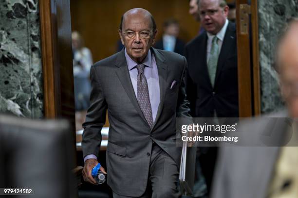 Wilbur Ross, U.S. Commerce secretary, arrives to a Senate Finance Committee hearing on current and and proposed tariff actions in Washington, D.C.,...