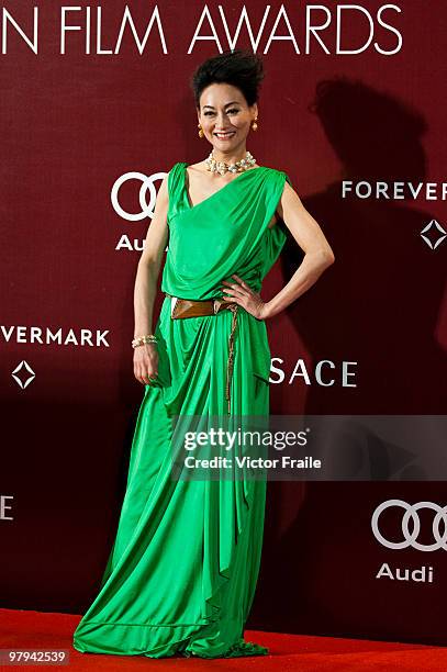 Actress Wai Ying-hung poses on the red carpet for the 4th Asian Film Awards ceremony at the Convention and Exhibition Centre on March 22, 2010 in...