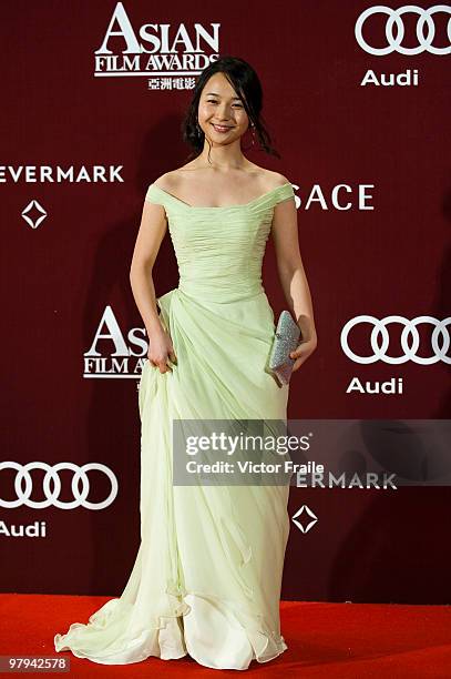 South Korean actress Kim Kkobbi poses on the red carpet for the 4th Asian Film Awards ceremony at the Convention and Exhibition Centre on March 22,...