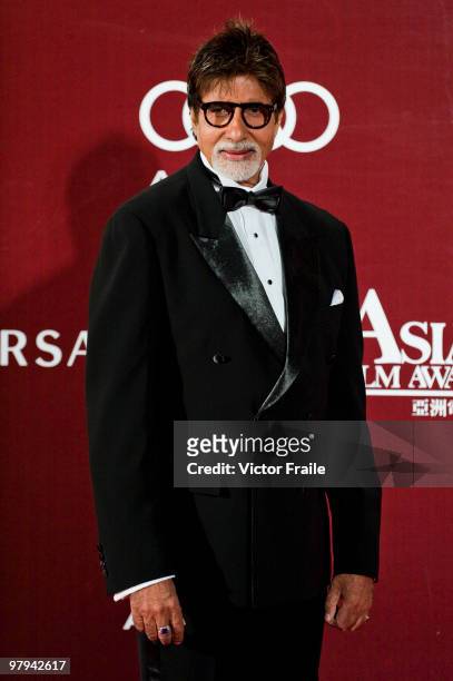 Indian actor Amitabh Bachchan poses on the red carpet for the 4th Asian Film Awards ceremony at the Convention and Exhibition Centre on March 22,...