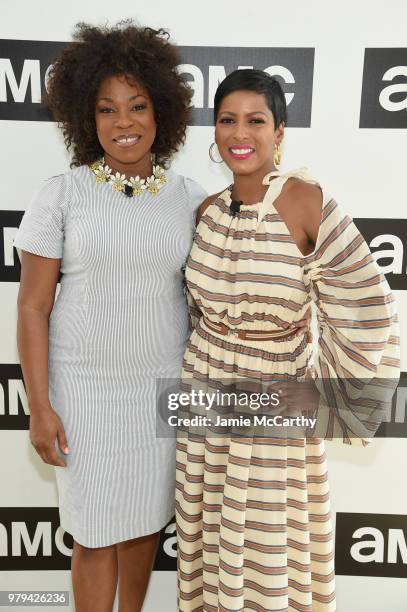 Lorraine Touissant and Tamron Hall attend the AMC Summit at Public Hotel on June 20, 2018 in New York City.