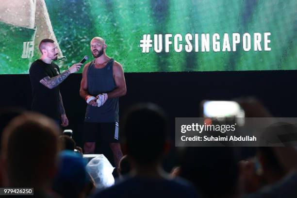 Donald Cerrone of United States speaks to fans during the UFC Fight Night Open Workout at OCBC Square on June 20, 2018 in Singapore.