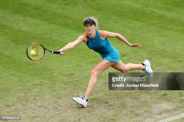 Elina Svitolina of the Ukraine plays a forehand during her Round of 16 match against Alize Cornet of France during Day Five of the Nature Valley...