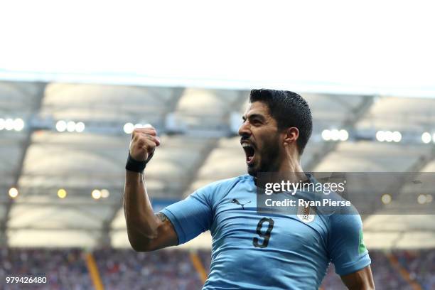 Luis Suarez of Uruguay celebrates after scoring his team's first goal during the 2018 FIFA World Cup Russia group A match between Uruguay and Saudi...