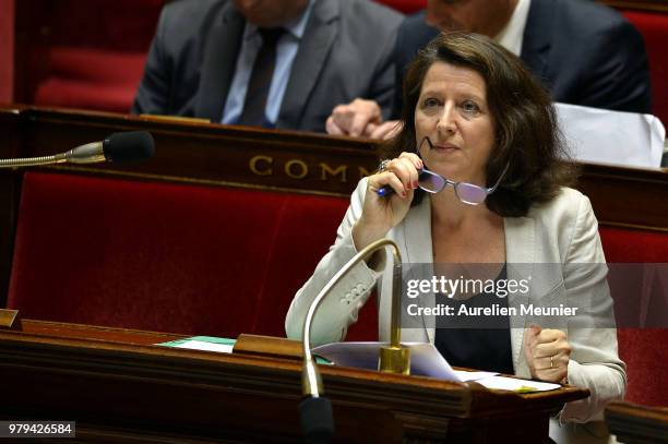 Agnes Buzyn, French Minister for Solidarity and Health reacts as ministers answer deputies during the weekly session of questions to the government...