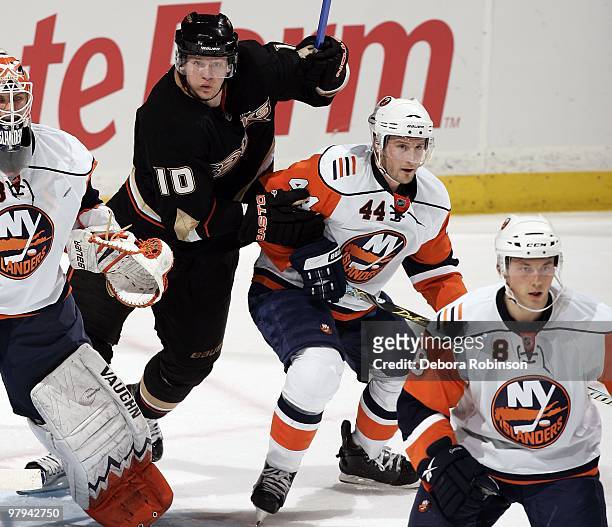 Corey Perry of the Anaheim Ducks battles through traffic in front of the net of the New York Islanders during the game on March 19, 2010 at Honda...