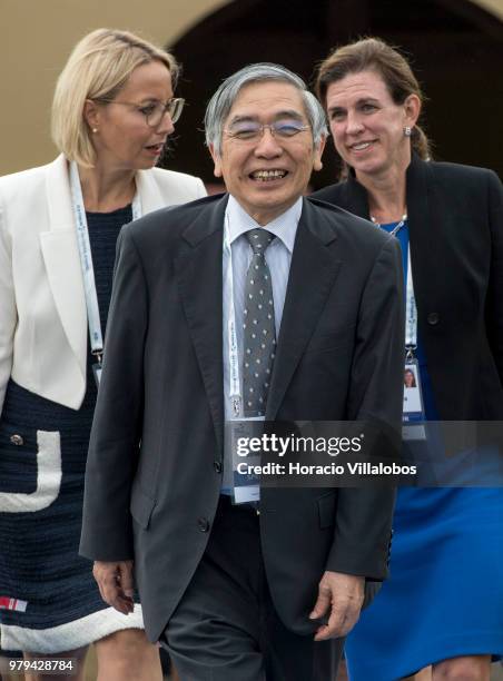 Haruhiko Kuroda, Governor of Bank of Japan, leaves at the end of the afternoon discussion session during the last day of ECB Forum on Central...