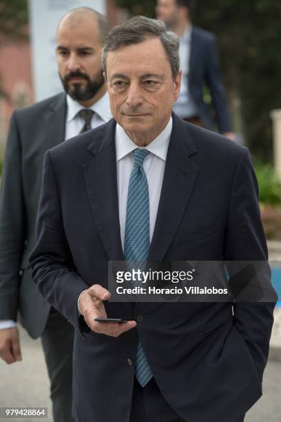 Mario Draghi, President of the European Central Bank, leaves at the end of the afternoon discussion session during the last day of ECB Forum on...