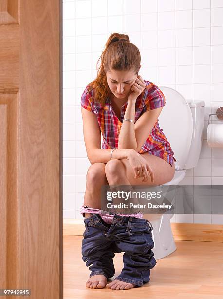 girl with constipation irritable bowel syndrome in - woman hemorrhoids fotografías e imágenes de stock