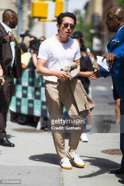 Steven Yeun is seen in NoHo on June 20, 2018 in New York City.
