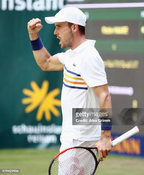 Roberto Bautista Agut of Spain celebrates during his round of 16 match against Robin Hase of Netherlands during day 3 of the Gerry Weber Open at...