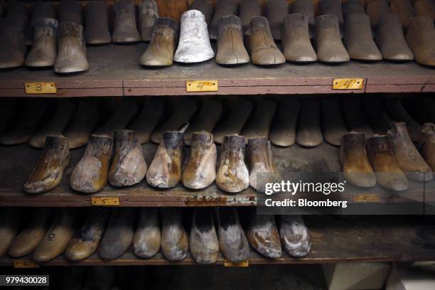 Wooden shoe patterns sit on shelves at the Dehner Co. Boot factory in Omaha, Nebraska, U.S., on Tuesday, June 5, 2018. Markit is scheduled to release...