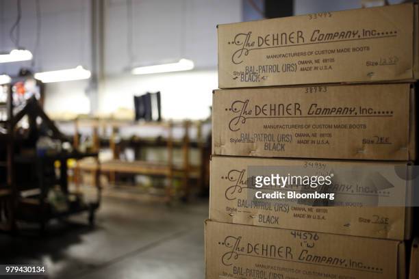 Boxes of leather boots sit stacked at the Dehner Co. Factory in Omaha, Nebraska, U.S., on Tuesday, June 5, 2018. Markit is scheduled to release...