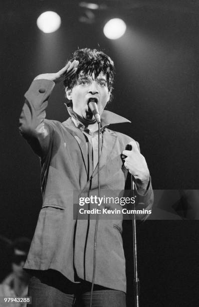 Singer Alan Vega of American band Suicide performs on stage at the Apollo Theatre in Manchester, England on July 02, 1978.