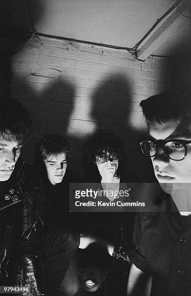Posed group portrait of British band Sisters of Mercy. Left to right are Craig Adams, Gary Marx, Andrew Eldritch and Ben Gunn on November 12, 1982.