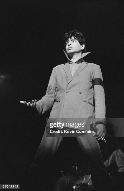 Singer Alan Vega of American band Suicide performs on stage at the Apollo Theatre in Manchester, England on July 02, 1978.