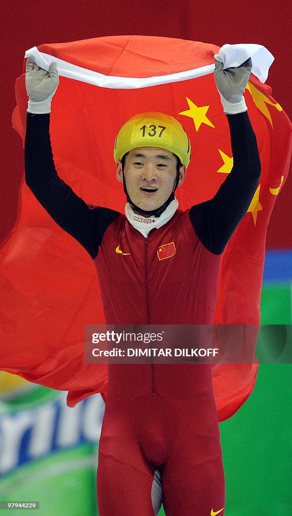 Wenhao Liang of China celebrates after w