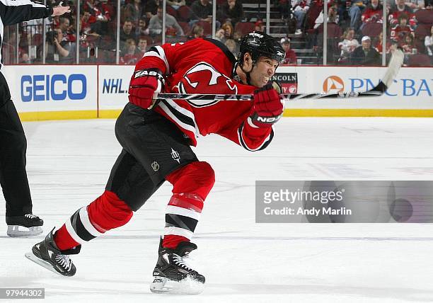 Brian Rolston of the New Jersey Devils fires a shot against the St. Louis Blues during the game at the Prudential Center on March 20, 2010 in Newark,...