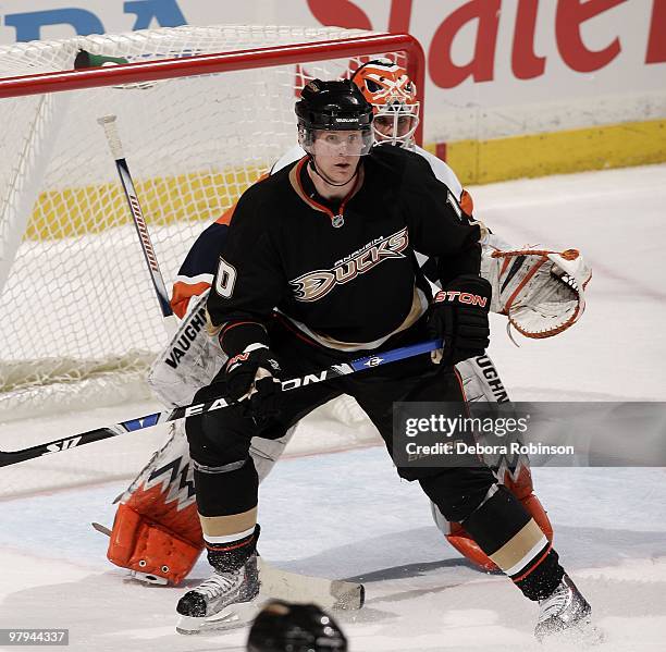 Corey Perry of the Anaheim Ducks defends outside the crease against the New York Islanders during the game on March 19, 2010 at Honda Center in...