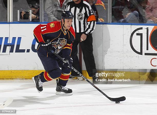 Gregory Campbell of the Florida Panthers skates with the puck against the Phoenix Coyotes in the first period on March 18, 2010 at the BankAtlantic...