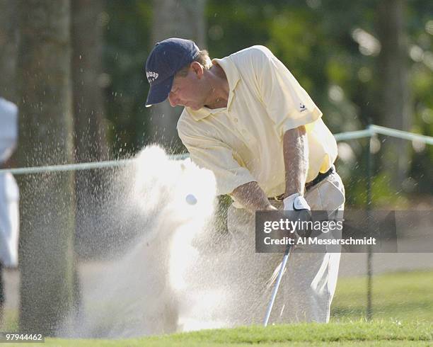 Mark Brooks blasts from the sand near the eighth green during first-round competition at the Funai Classic, October 21, 2004.