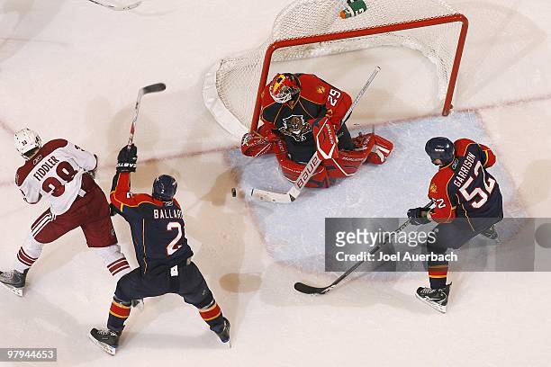 Goaltender Tomas Vokoun of the Florida Panthers stops a shot by Vernon Fiddler of the Phoenix Coyotes on March 18, 2010 at the BankAtlantic Center in...