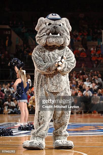 The Georgetown Hoyas mascot looks on during the Big East Quarterfinal College Basketball Championship game against the Syracuse Orange on March 11,...