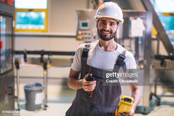 factory worker - obradovic stock pictures, royalty-free photos & images